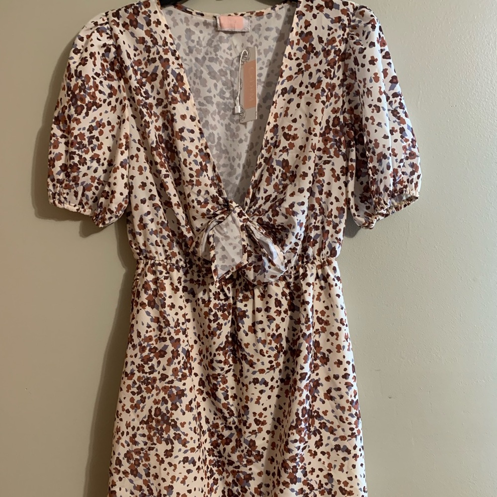 NWT CDM Sz M cream w/brown print. Tie bust line, flowy style w/ elastic waist.